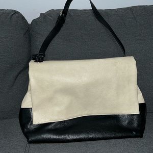 Carlos Santana  black and cream shoulder bag
